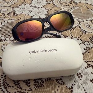 Calvin Klein Jeans Black Sunglasses with Pink Lenses
